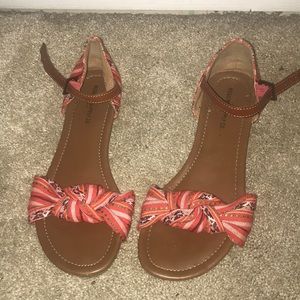 Red and tan detailed sandals
